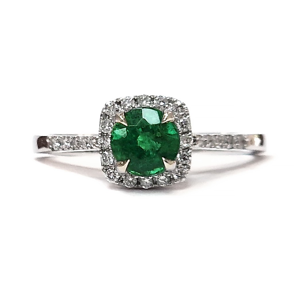 Пръстен със смарагд 0,63 к. и диаманти от бяло злато 14 к.